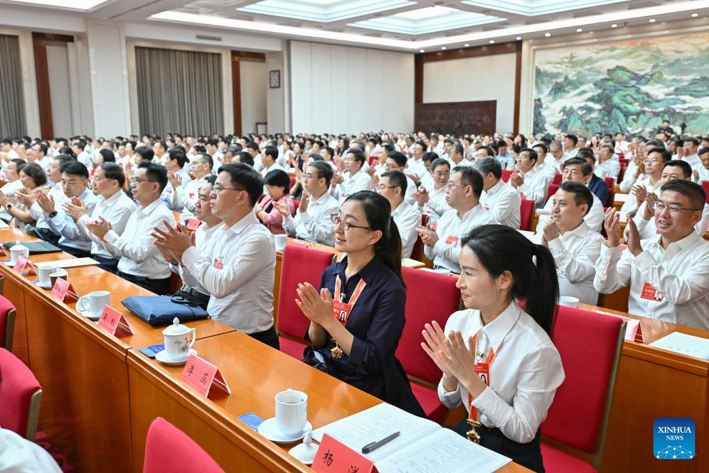 Participants applaud after a representative's speech at an awards ceremony to honor model teachers and outstanding groups and institutions in China's education sector in Beijing, China, September 8, 2024. /Xinhua