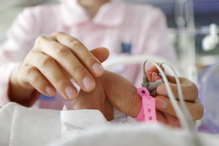 A nurse works at the neonatal intensive care unit (NICU) in a hospital in Suqian City, east China's Jiangsu Province, May 12, 2024. /Xinhua