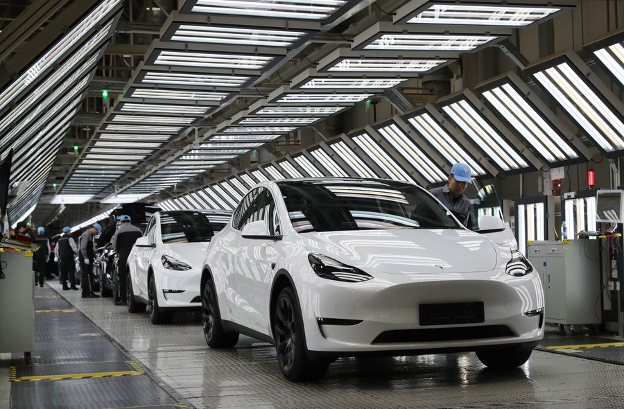 Employees work at Tesla's Shanghai Gigafactory in east China's Shanghai, December 22, 2023. /Xinhua