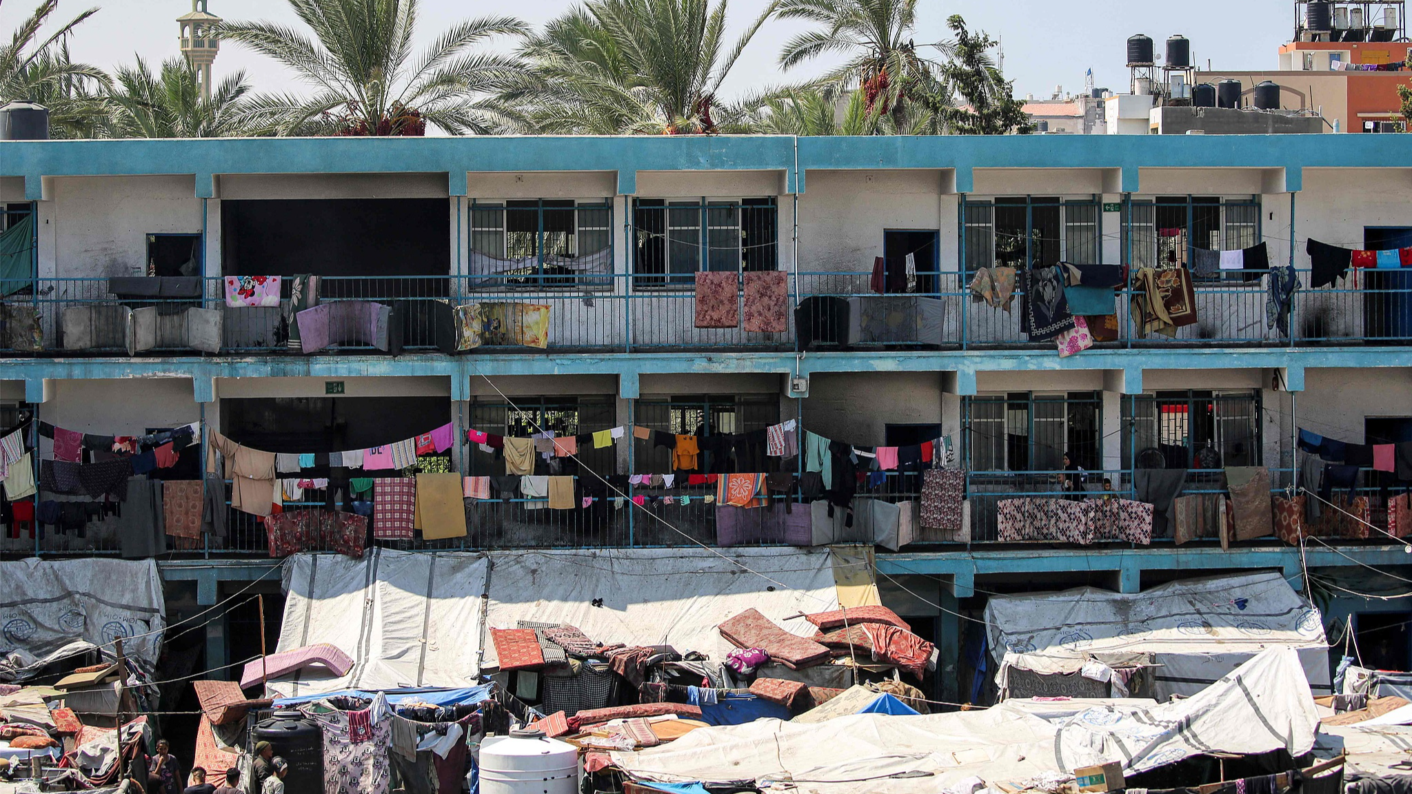 A view of a make-shift camp for people displaced by the Israel-Hamas conflict at a school run by the UN in Deir el-Balah in the central Gaza Strip, September 9, 2024. /CFP