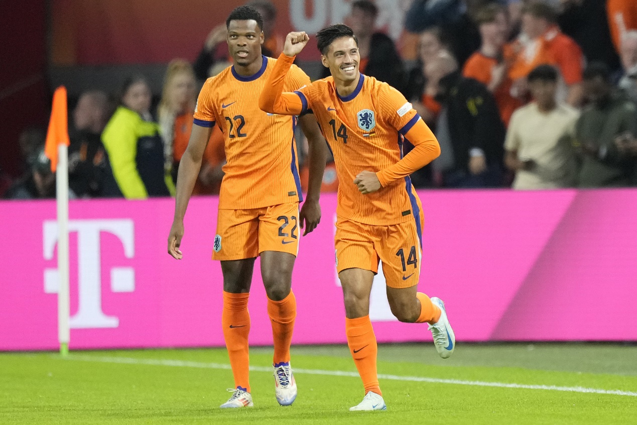 Tijjani Reijnders (R) of the Netherlands celebrates after he scores during their clash with Germany in Amsterdam, Netherlands, September 10, 2024. /CFP