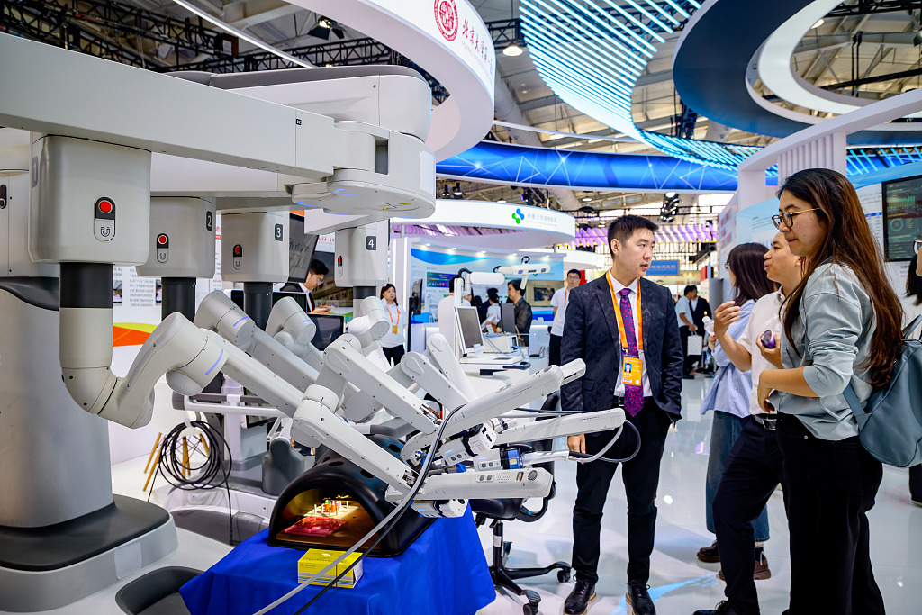 People visit an exhibition area of the 2024 China International Fair for Trade in Services (CIFTIS) at the Shougang Park in Beijing, September 12, 2024. /CFP