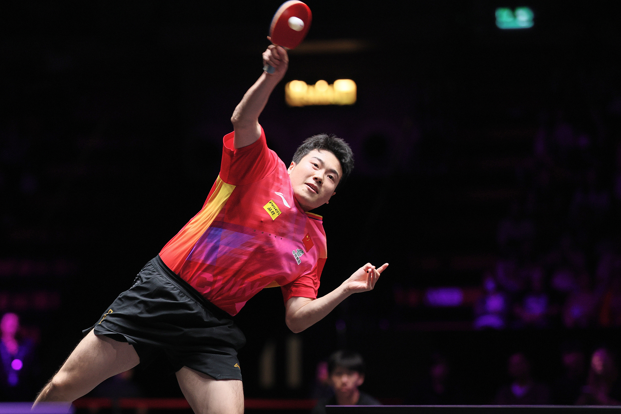 Liang Jingkun of China competes in the men's singles match against Simon Gauzy of France at the World Table Tennis Champions Macao in China's Macao Special Administrative Region, September 11, 2024. /CFP