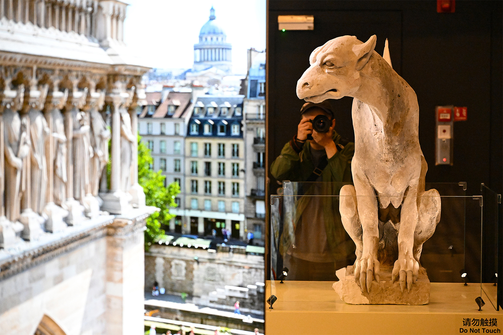 A chimera is displayed at an exhibition on the history and restoration of Notre-Dame de Paris at the National Museum of China in Beijing on September 11, 2024. /CFP