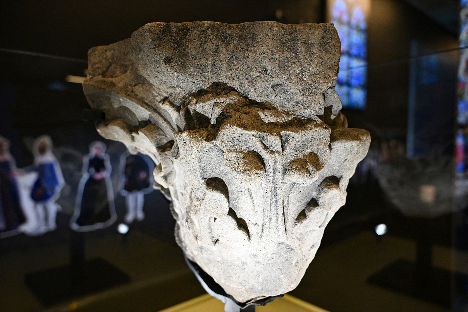 A Gothic column capital is displayed at an exhibition on the history and restoration of Notre-Dame de Paris at the National Museum of China in Beijing on September 11, 2024. /CFP