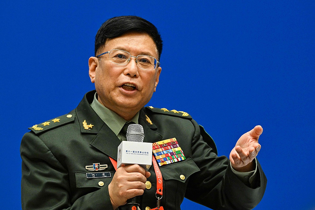 He Lei, former vice president of the PLA Academy of Military Sciences, attends a forum on 