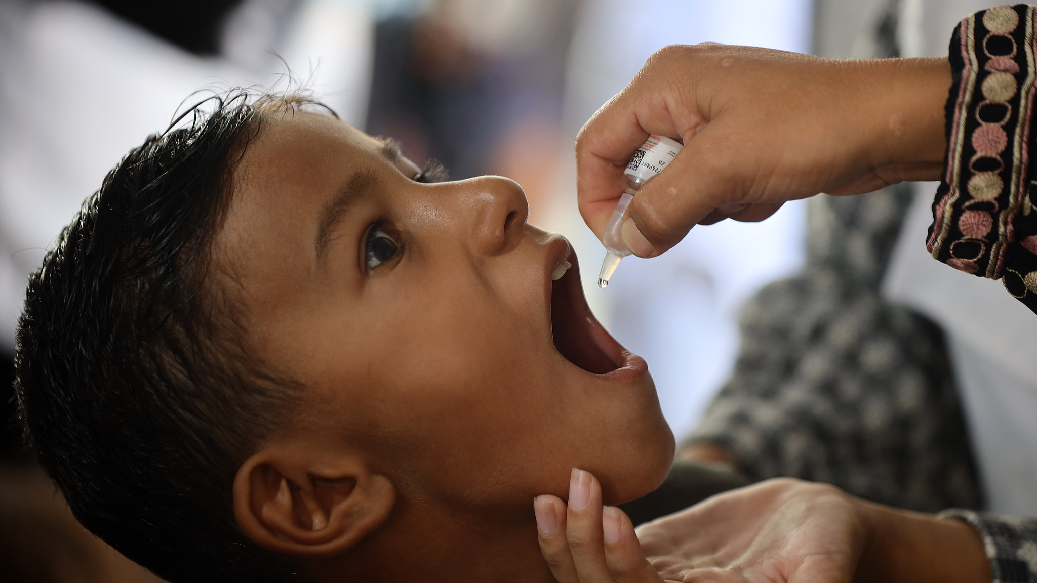 A Palestinian child receives a polio vaccination in Khan Younis in the southern Gaza Strip, September 5, 2024. /CFP