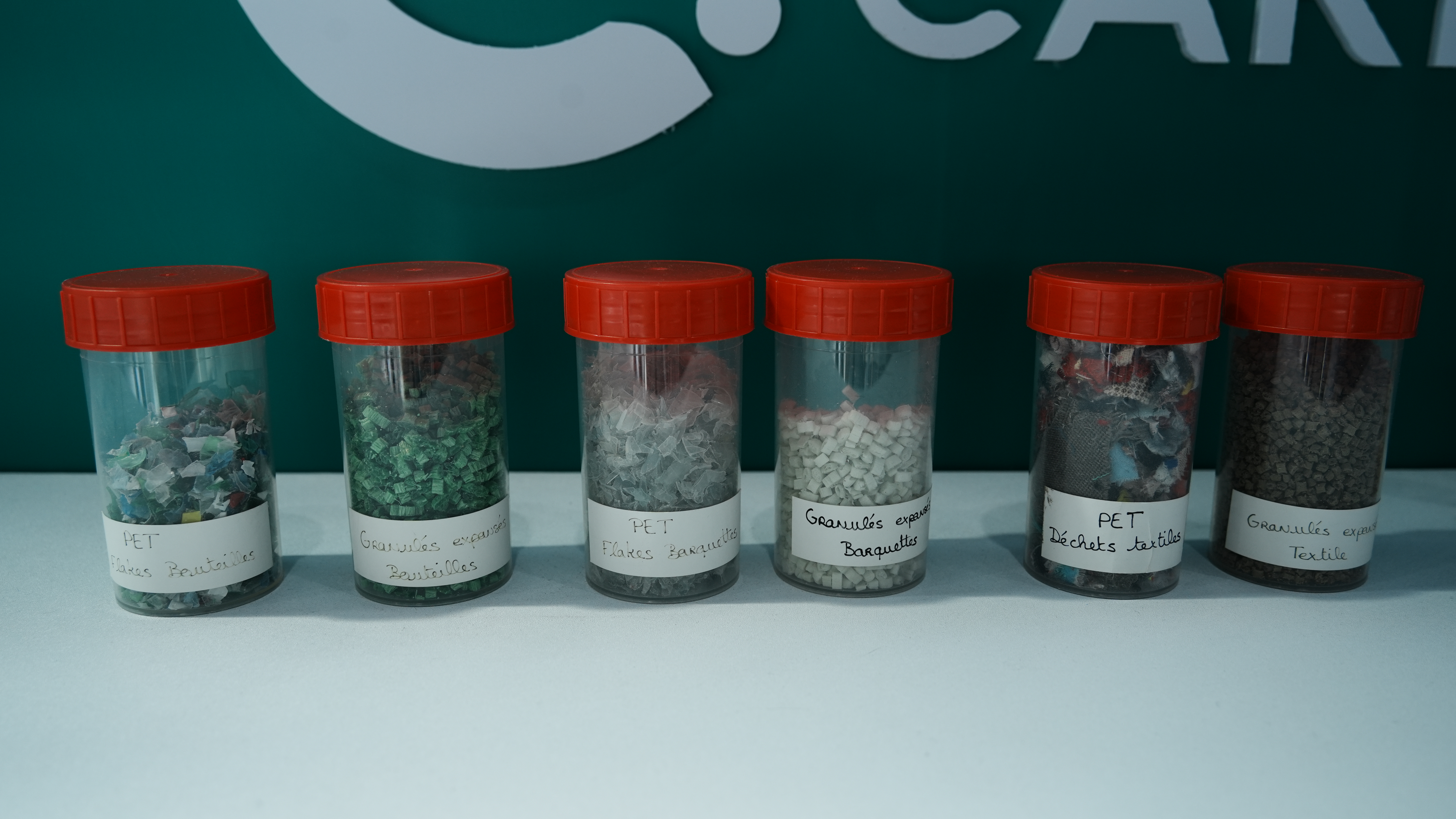 Various PET waste and the particles after pre-treatment exhibited at the 2024 China International Fair for Trade in Services (CIFTIS), Beijing, China. /CGTN