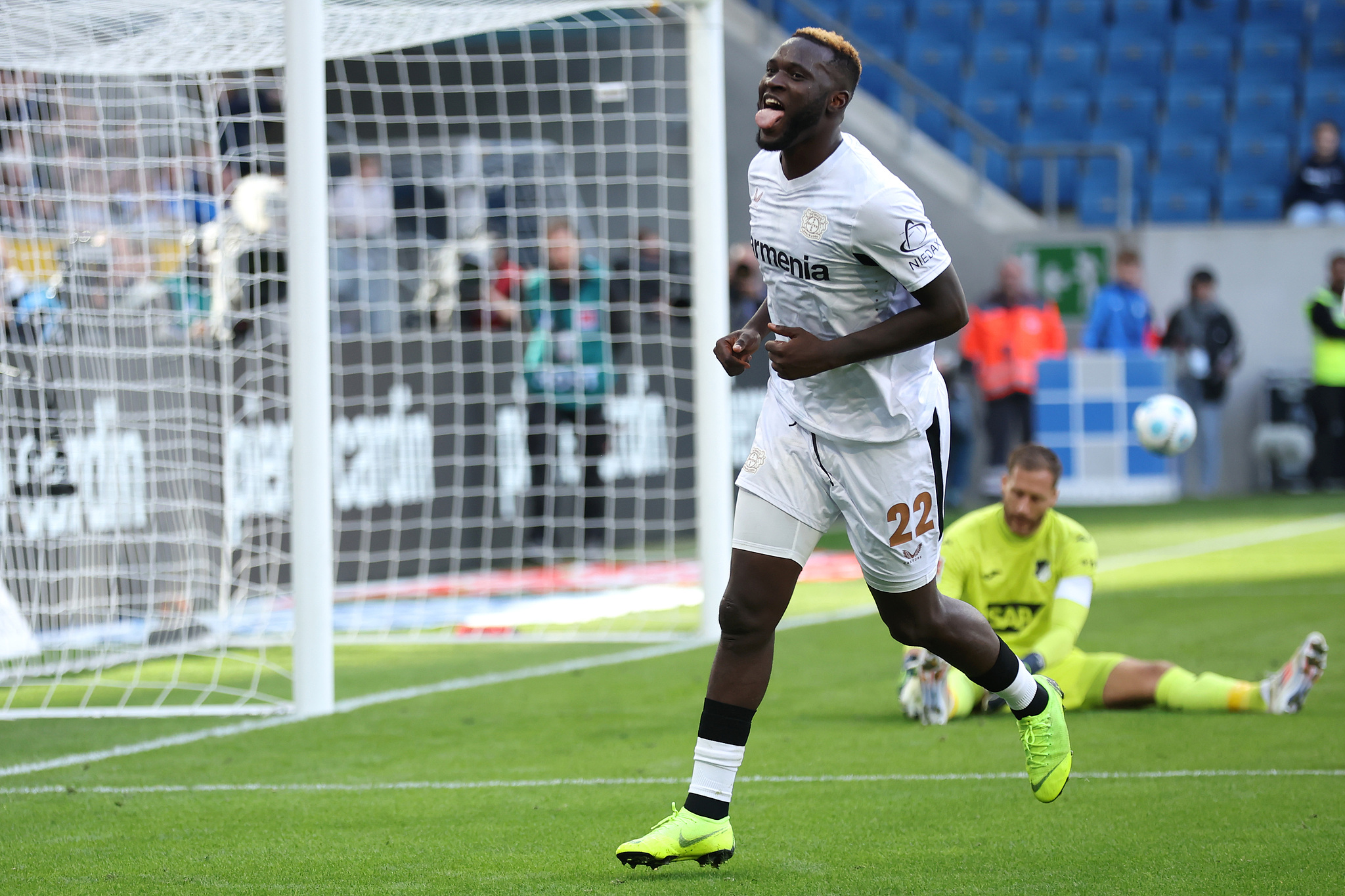 Victor Boniface (#22) of Bayer Leverkusen celebrates after scoring a goal against Hoffenheim in a German Bundesliga game at PreZero-Arena in Sinsheim, Germany, September 14, 2024. /CFP 