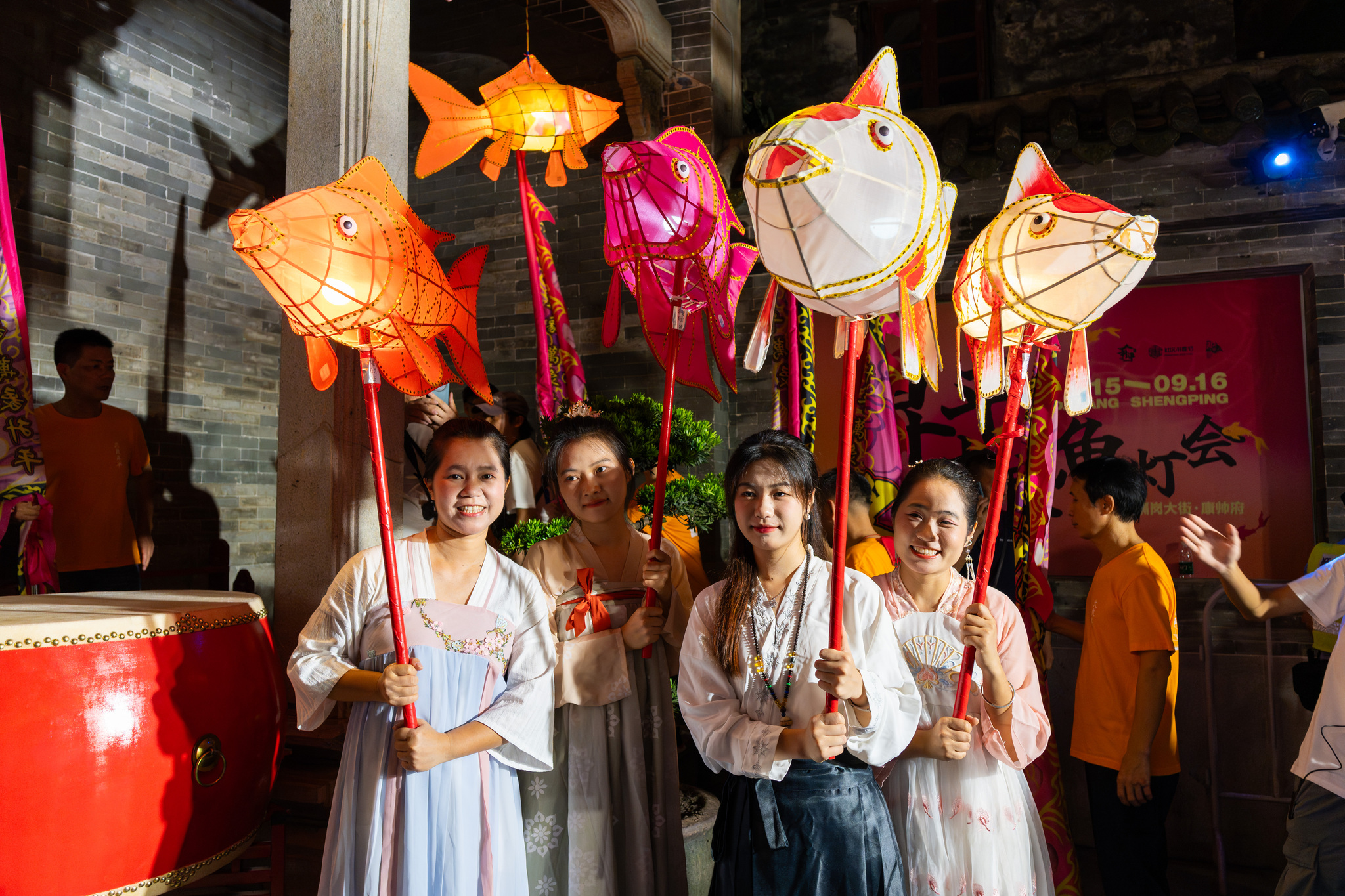 Visitors pose with fish lanterns at the fourth Daliang Fish Lantern Festival in Foshan, Guangdong Province on September 15, 2024. /CFP