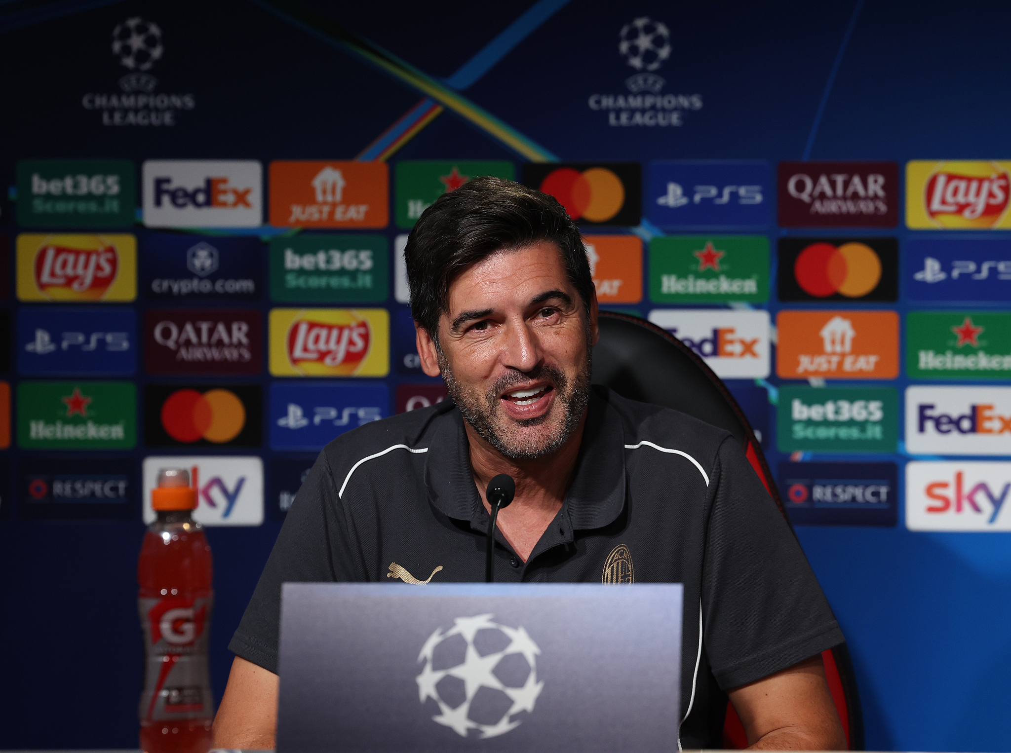 Paulo Fonseca, head coach of AC Milan, speaks with media at a press conference in Cairate, Italy, September 16, 2024. /CFP