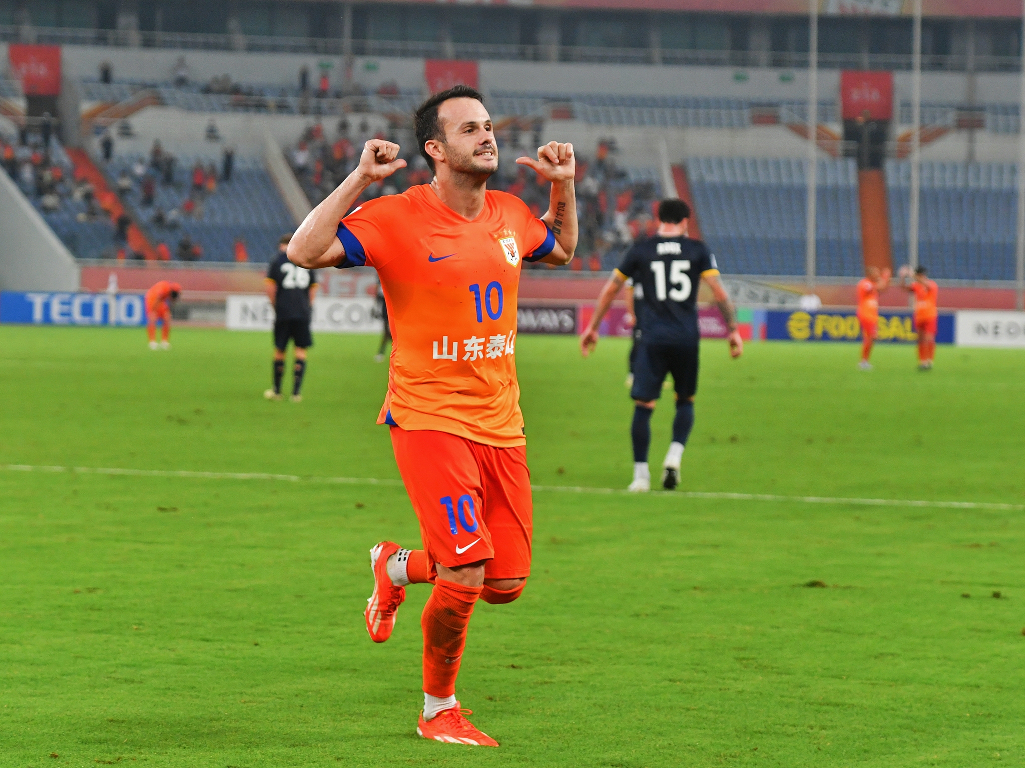 Valeri Qazaishvili (#10) of Shandong Taishan celebrates after scoring a goal against Central Coast Mariners in their Asian Football Confederation (AFC) Champions League Elite match in Jinan, east China's Shandong Province, September 17, 2024. /CFP