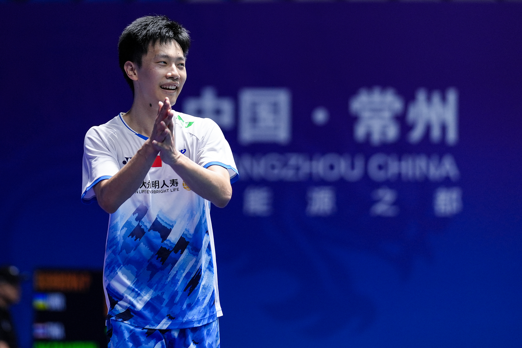 Lei Lanxi of China celebrates his victory over Viktor Axelsen of Denmark (not pictured) after their men's singles first round match at the BWF China Open in Changzhou, China, September 18, 2024. /CFP