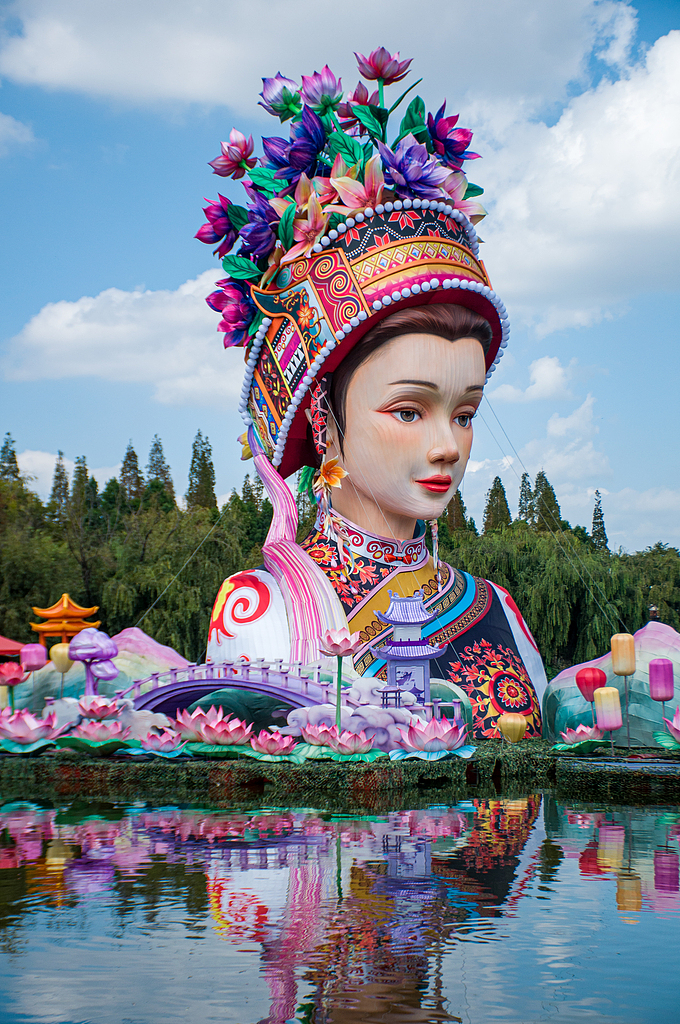 A lantern set featuring the Yunnan folklore figure Ashima is seen in Daguan Park in Kunming, Yunnan Province on September 18, 2024. /CFP