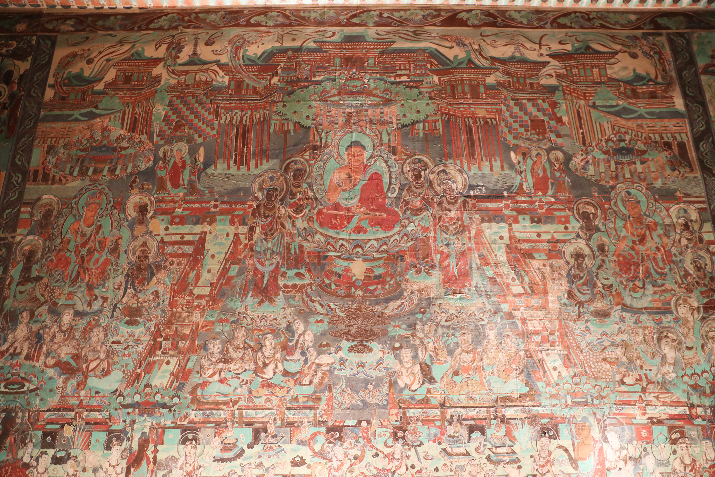 Mural terlihat di replika Gua Mogao 217 di Pusat Pameran Konservasi dan Penelitian Peninggalan Gua Dunhuang di Dunhuang, Provinsi Gansu pada tanggal 20 September 2024. Gua Mogao 217 yang asli dibangun pada tahun 705-707 pada masa Dinasti Tang (618-907). /CGTN