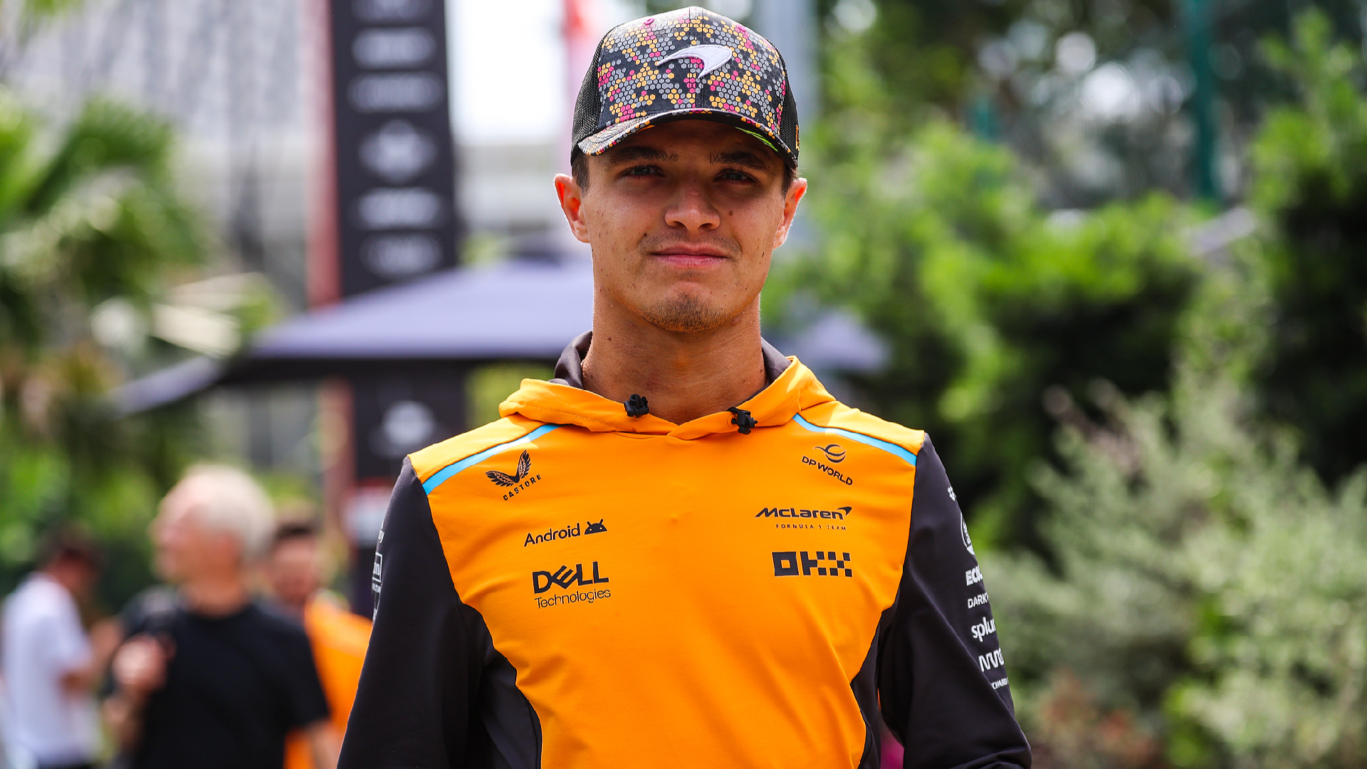 Norris puts McLaren on top in Singapore, Russell crashes
