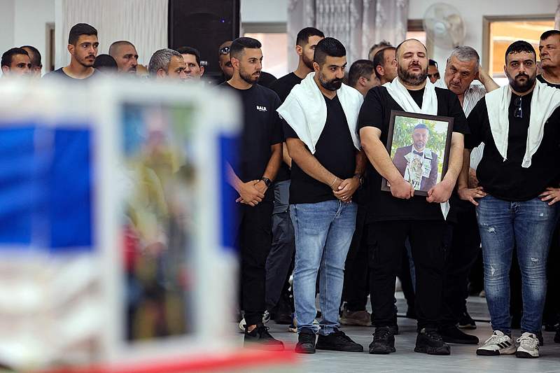 Members of Israel's Druze community attend the funeral of reservist Major Nael Fwarsy, 43, killed a day earlier near the northern border with Lebanon, in the northern village of Maghar, September 20, 2024. /CFP