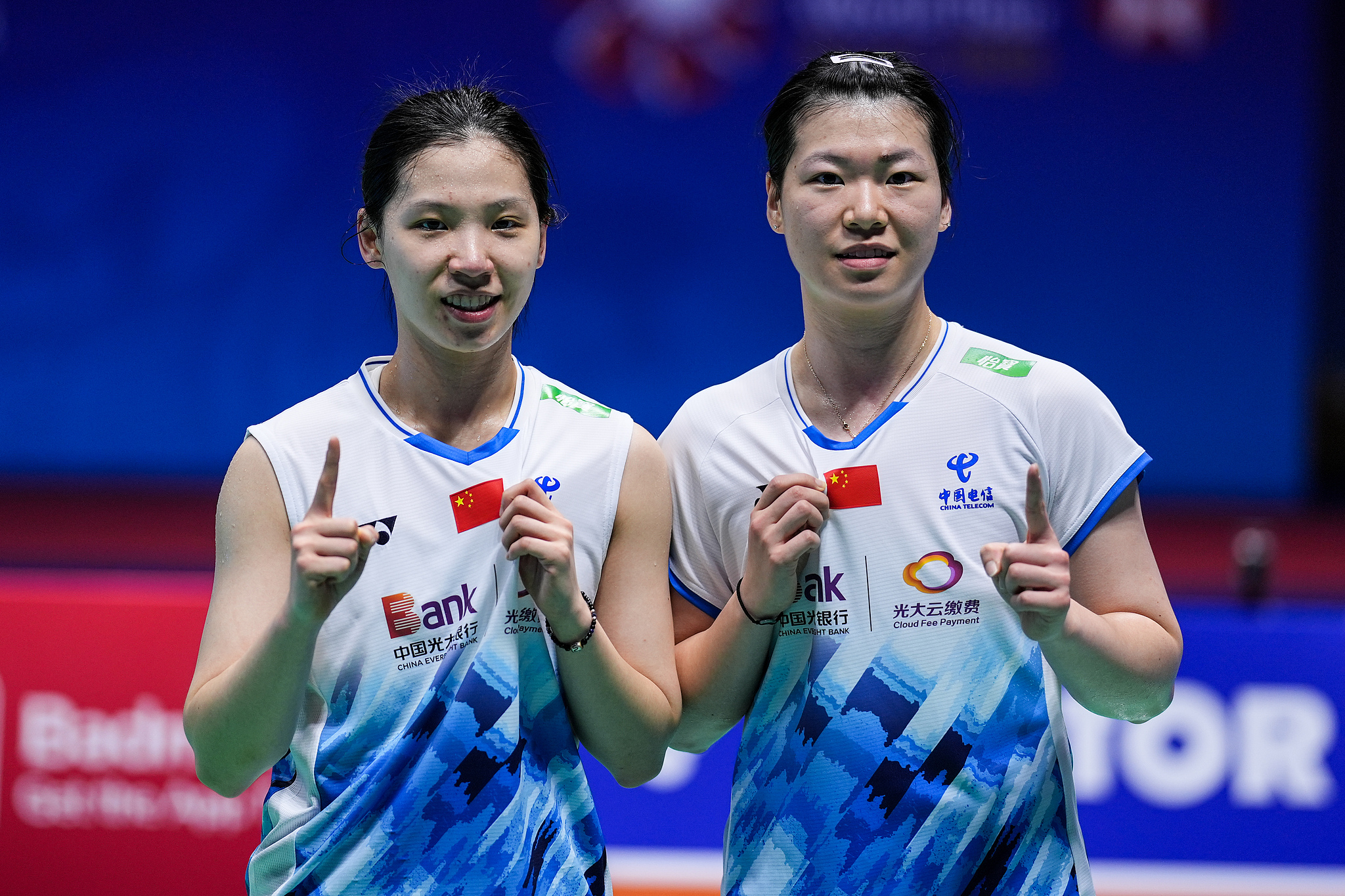 Li Yijing (L) and Luo Xumin of China celebrate their victory in the women's doubles final at the BWF China Open in Changzhou, China, September 22, 2024. /CFP