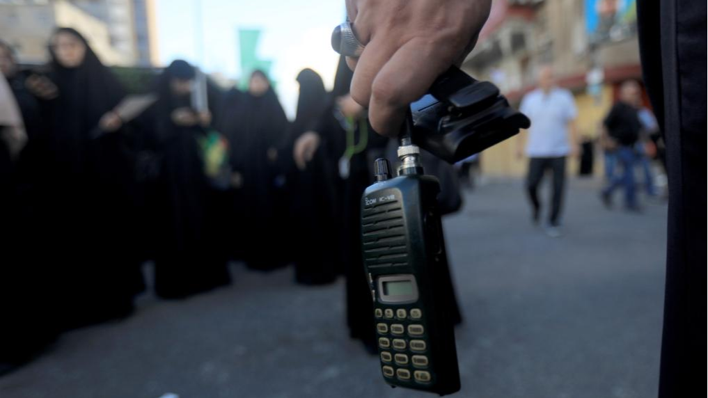 A wireless communication device in the hand of a Hezbollah member, the battery of which was removed after a wireless communication device exploded during a funeral, Beirut, Lebanon, September 18, 2024. /Xinhua