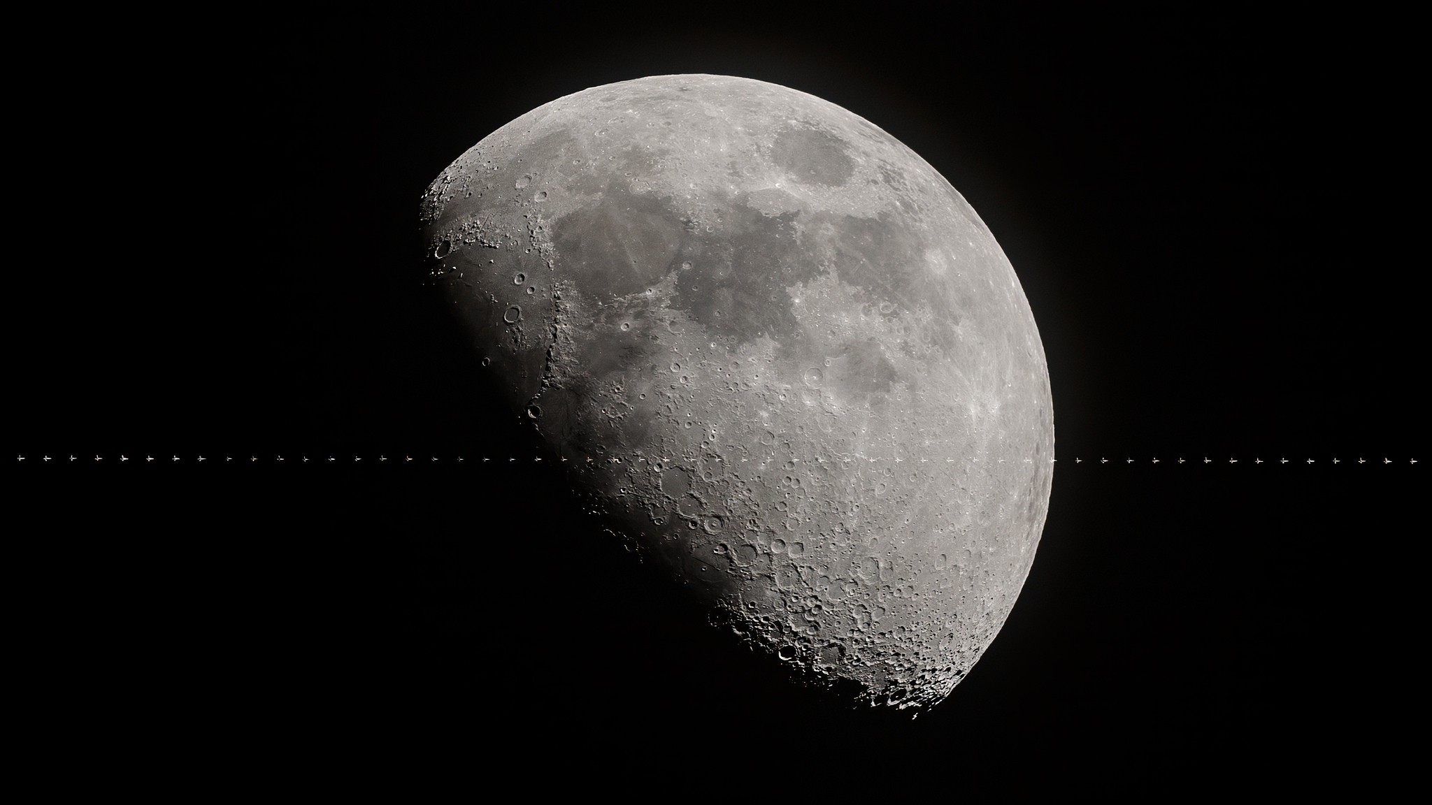 The China Space Station was pictured passing the moon in April 2024 from Wuhan, central China's Hubei Province. /CFP