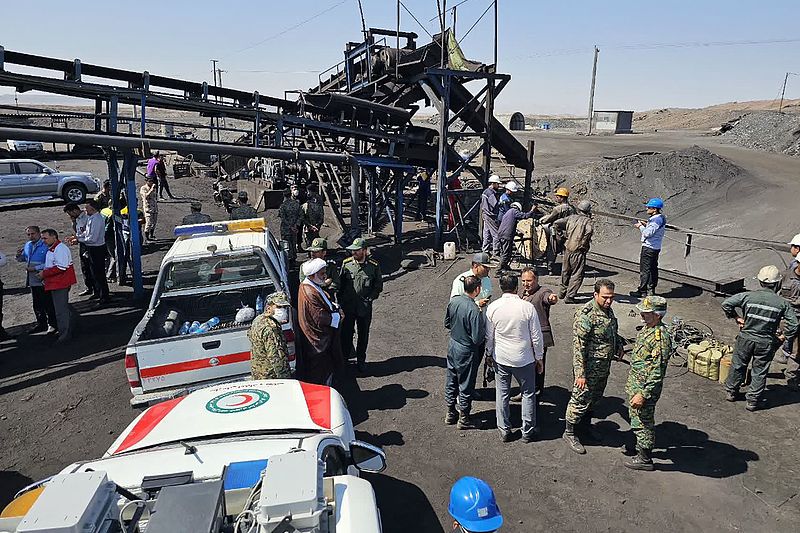 A handout picture provided by the Iranian Red Crescent (RCS) shows security forces gathered at the scene of a blast at a coal mine in Tabas in Iran's Khorasan province, September 22, 2024. /CFP