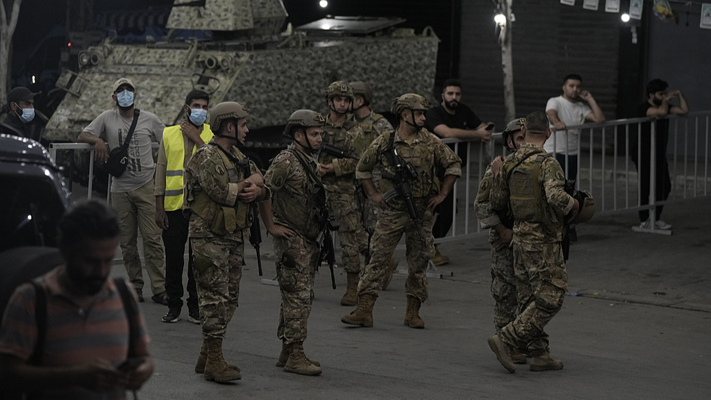 Lebanese soldiers secure the area near the site of an Israeli airstrike in Beirut's southern suburb, September 23, 2024. /CFP