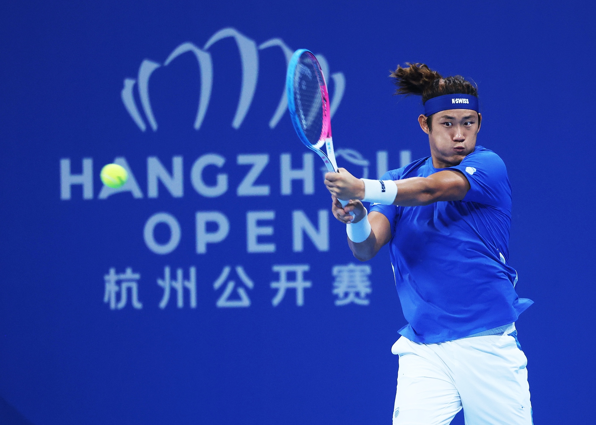 Zhang Zhizhen of China hits a shot in the men's singles final against Marin Cilic (not pictured) at the Hangzhou Open in Hangzhou, east China's Zhejiang Province, September 24, 2024. /CFP