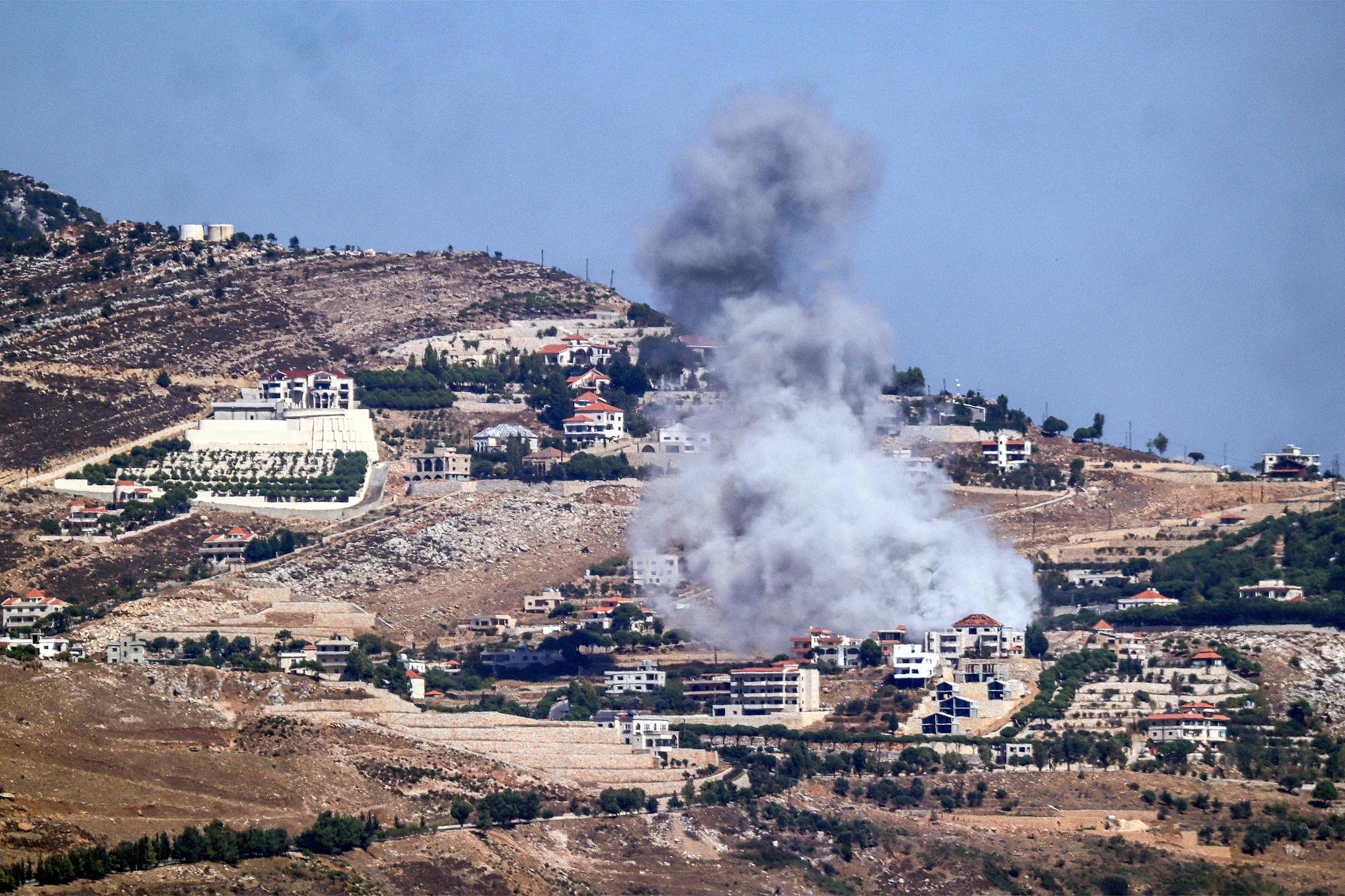 A cloud of smoke erupts during an Israeli air strike on the village of Sujud in southern Lebanon, September 25, 2024. /CFP