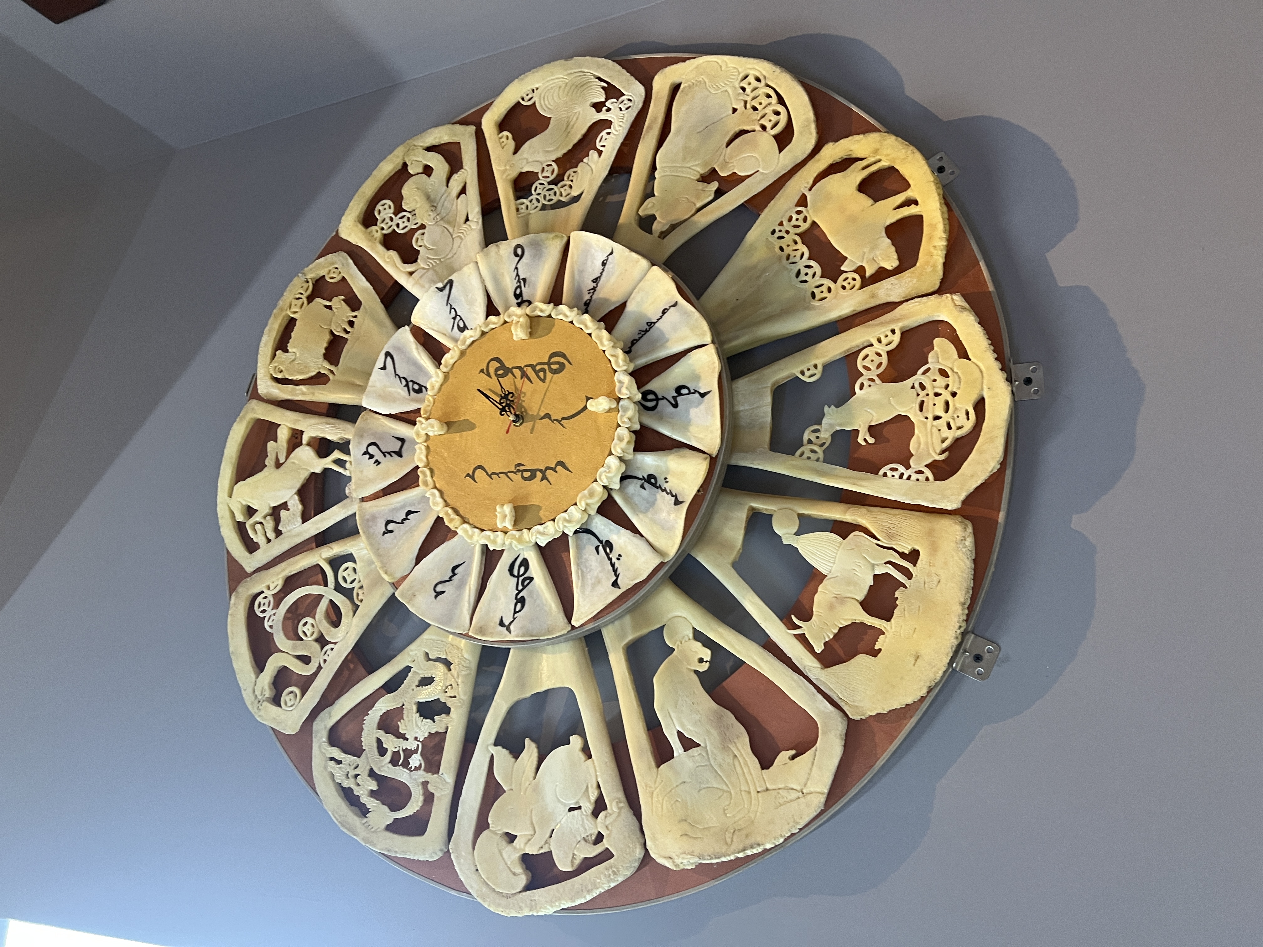 A clock made with the bones of camels and sheep is seen on display at a camel-themed exhibition in Badain Jaran, Inner Mongolia Autonomous Region, September 19, 2024. /CGTN