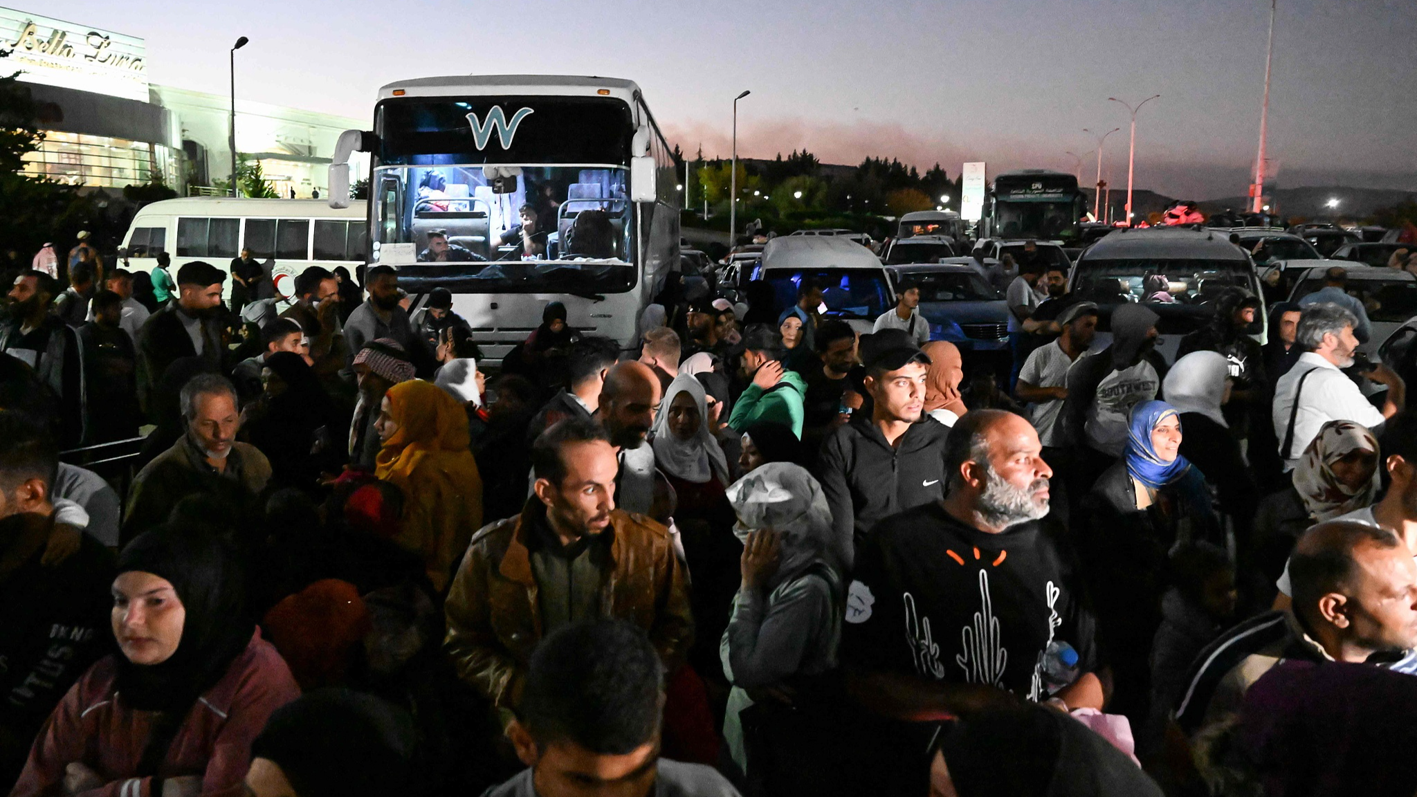 People fleeing from Lebanon arrive on the Syrian side of the border with Lebanon in Jdeidat Yabus in southwestern Syria, September 25, 2024. /CFP