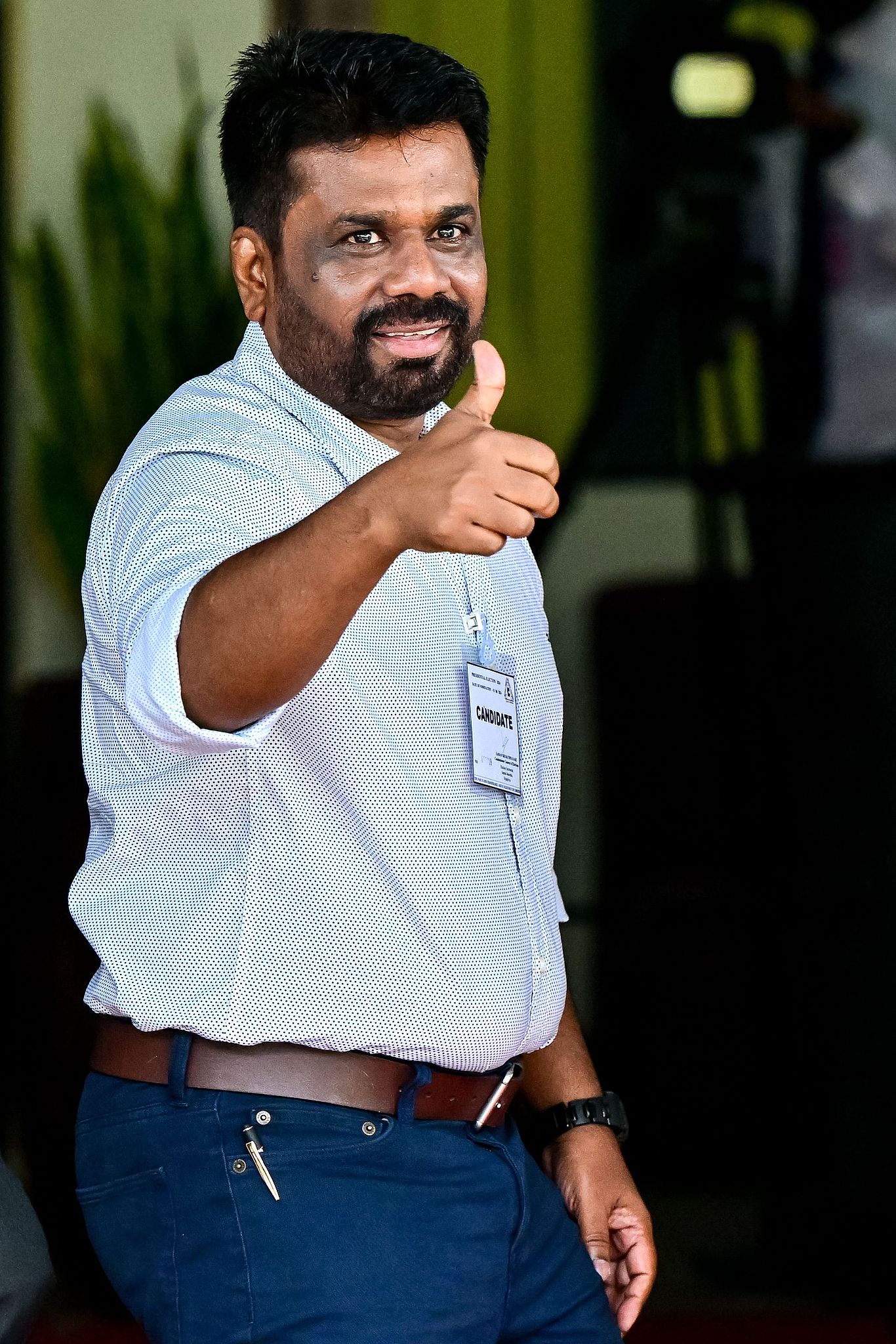 Anura Kumara Dissanayake gestures upon his arrival at the Election Commission office before filing his nomination papers for the presidential elections in Colombo, Sri Lanka, August 15, 2024. /CFP