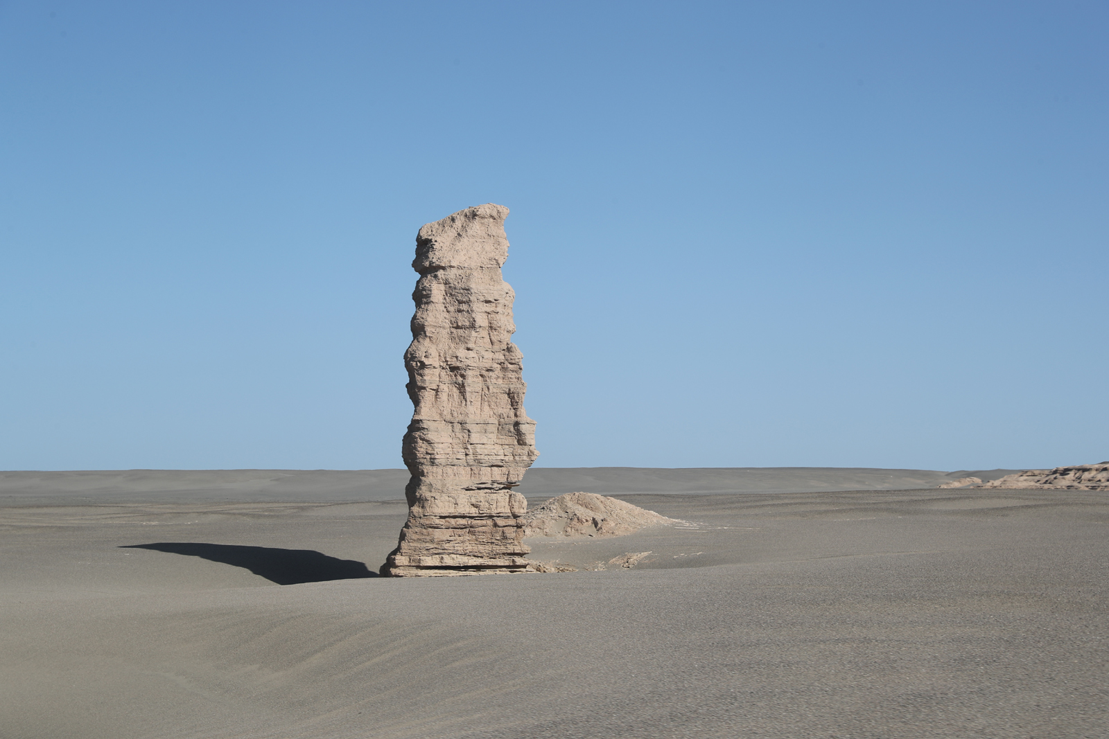 A stone pillar is seen at Dunhuang Yardang National Geopark in Gansu Province. /CGTN