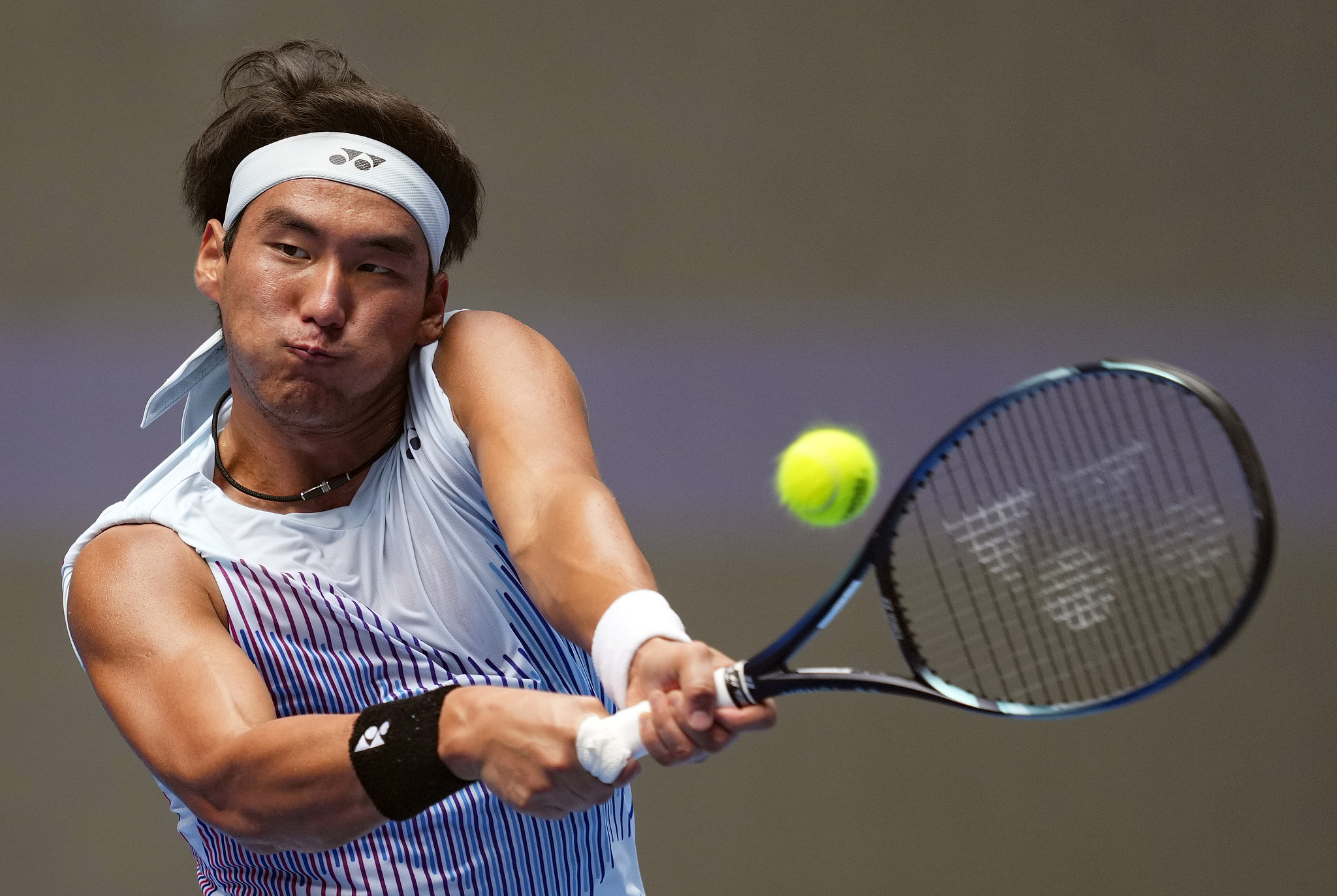 Buyunchaokete of China competes in the men's singles match against Lorenzo Musetti of Italy at the China Open in Beijing, September 29, 2024. /CFP