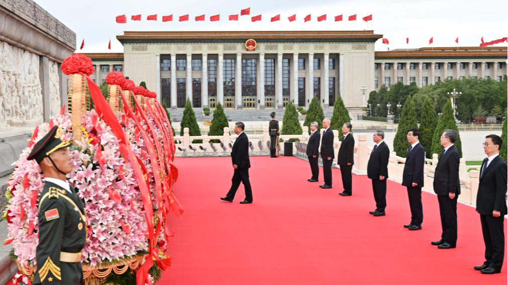 Chinese President Xi Jinping and other Party and state leaders including Li Qiang, Zhao Leji, Wang Huning, Cai Qi, Ding Xuexiang, Li Xi and Han Zheng attend a ceremony to present flower baskets to fallen heroes at Tiananmen Square in Beijing, China, September 30, 2024. /Xinhua