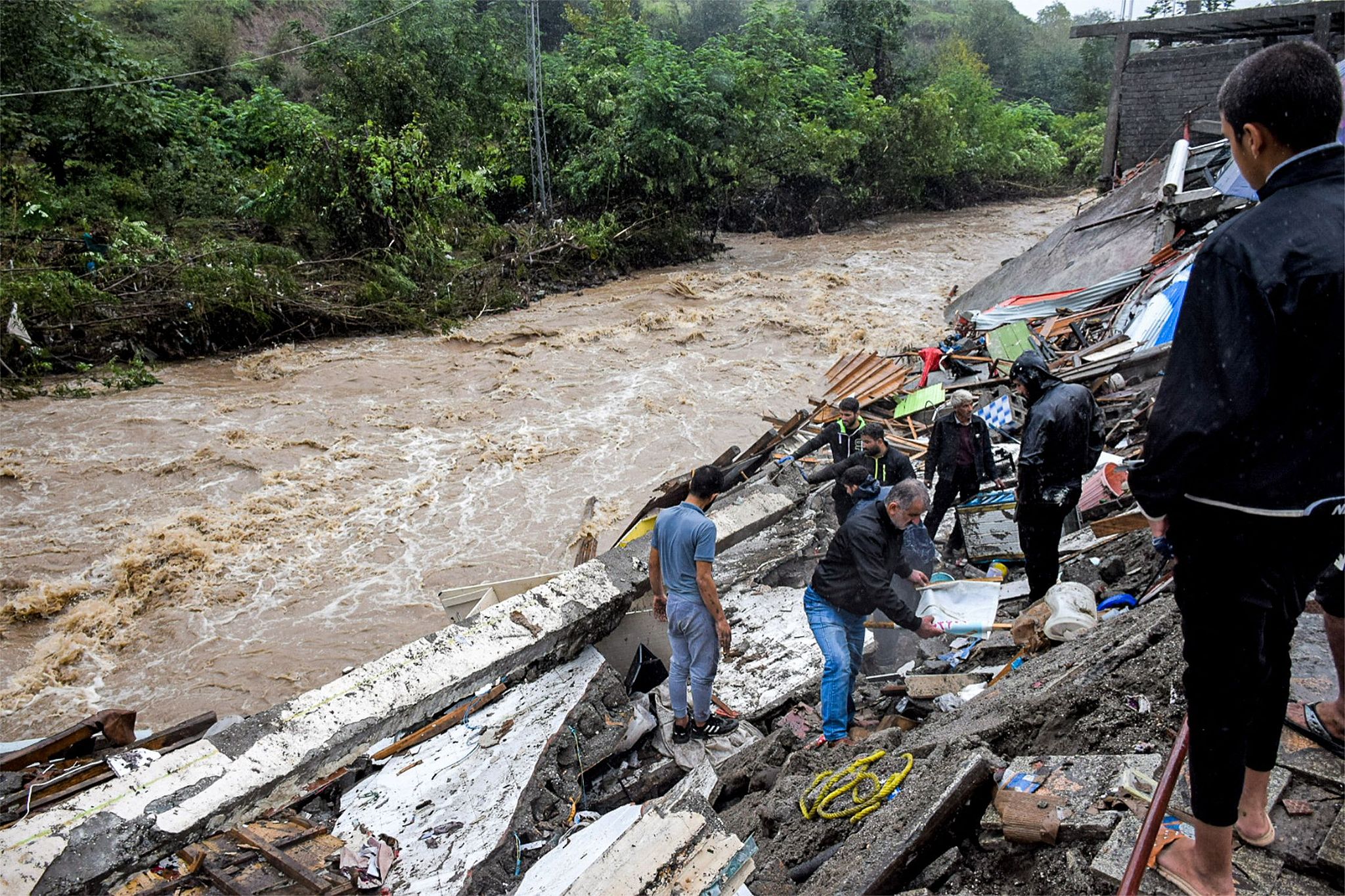 The wreckage amidst heavy flooding in Iran's northwestern city of Astara in Gilan province close to the border with Azerbaijan, September 18, 2023. /CFP