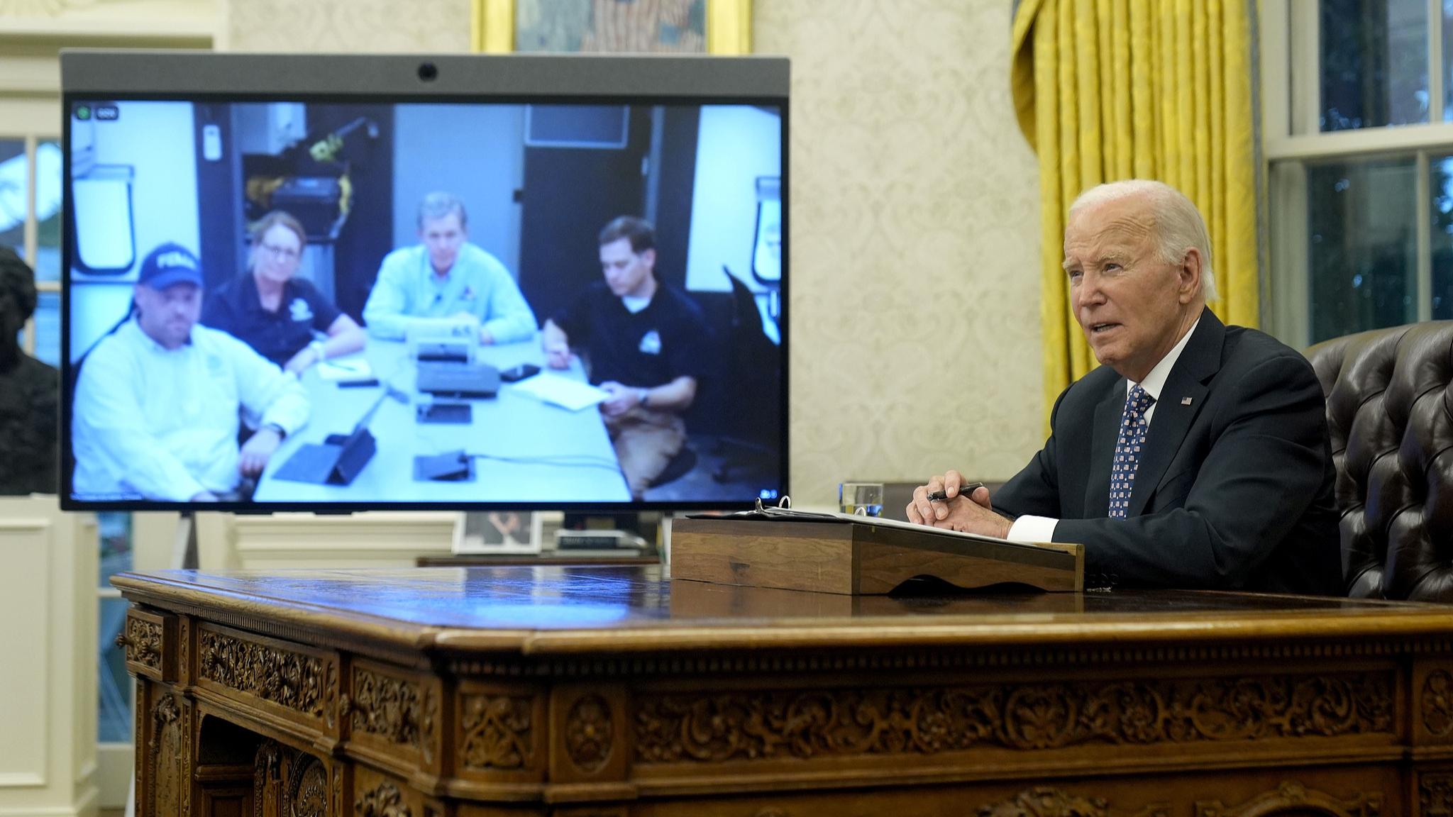 President Joe Biden speaks with North Carolina Governor Roy Cooper and Administrator of the U.S. Federal Emergency Management Agency Deanne Criswell about the Biden administration's efforts to aid in recovery from the aftermath of Hurricane Helene from the Oval Office of the White House in Washington, D.C., U.S., September 30, 2024. /CFP