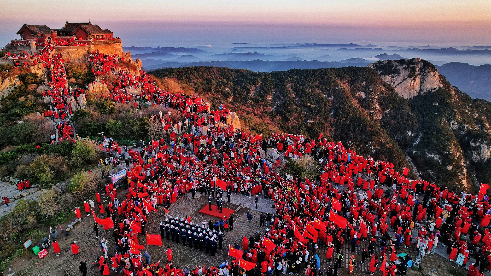 Tourists celebrate National Day at Mt. Taishan in Tai'an City, east China's Shandong Province, October 1, 2024. /CFP