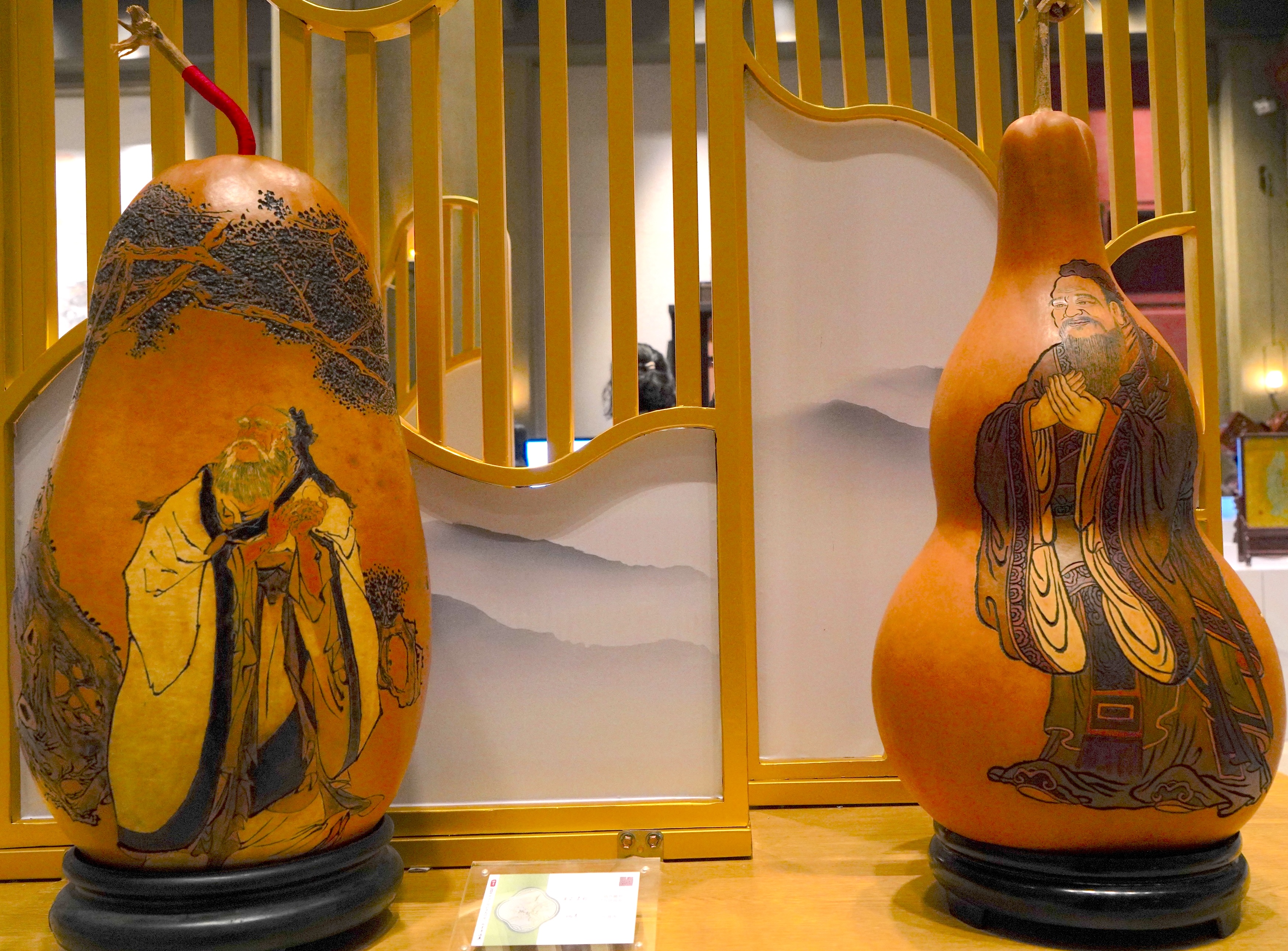 Gourd carvings of Confucius are on display at the 2024 China International Confucius Cultural Festival in Qufu, Shandong Province. /CGTN