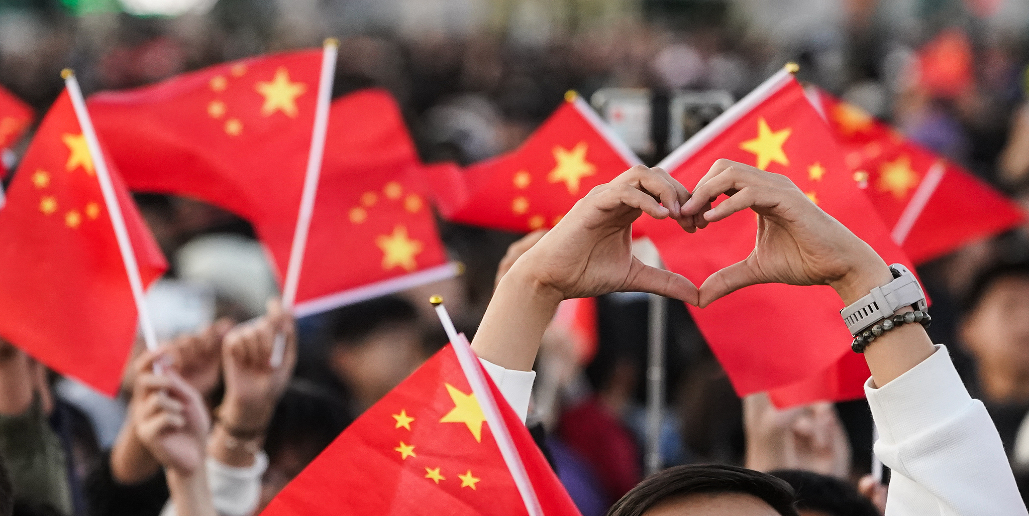 People attend a flag-raising ceremony marking the 75th anniversary of the founding of the People's Republic of China at the Tiananmen Square in Beijing, China, October 1, 2024. /CFP