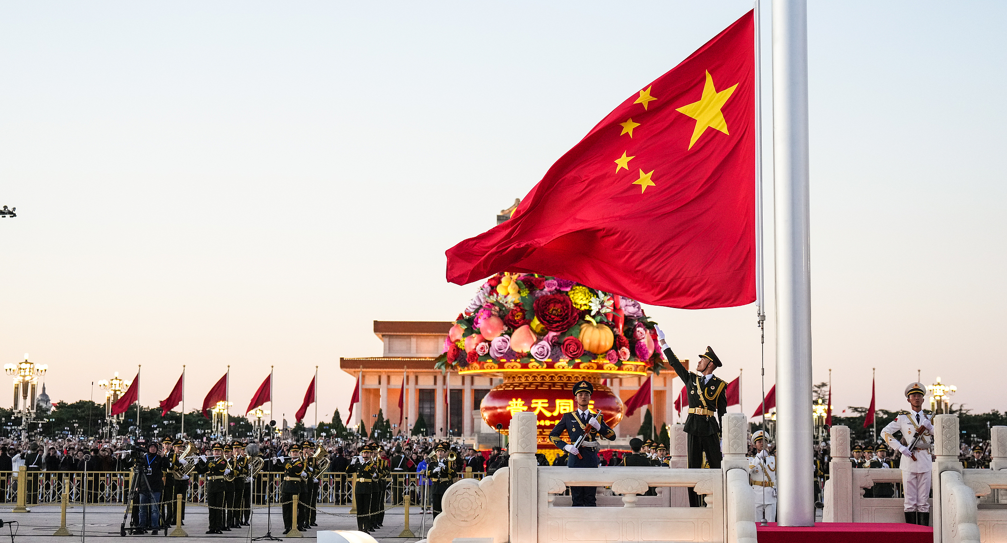 A flag-raising ceremony marking the 75th anniversary of the founding of the People's Republic of China is held at the Tiananmen Square in Beijing, China, October 1, 2024. /CFP