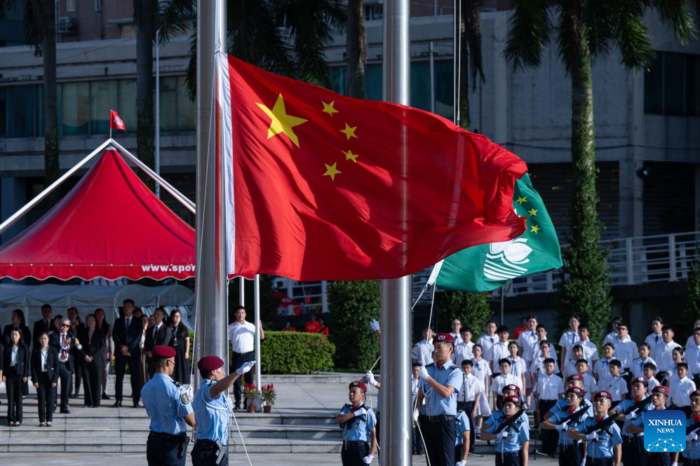 A flag-raising ceremony marking the 75th anniversary of the founding of the People's Republic of China is held in Macao, south China, October 1, 2024. /Xinhua