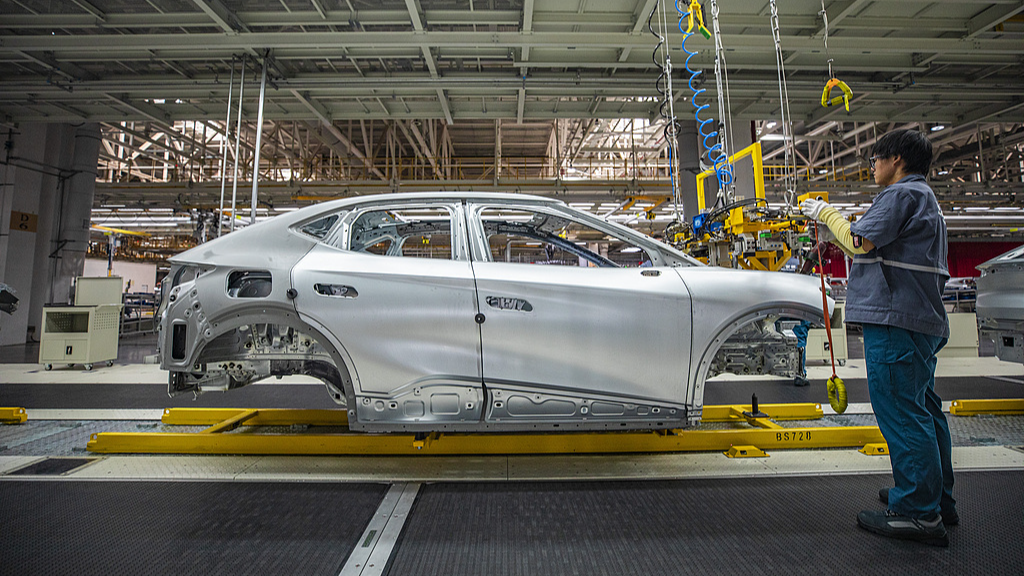 Workers are busy at a smart electric vehicle factory in Hefei City, Anhui Province, east China, September 25, 2024. /CFP