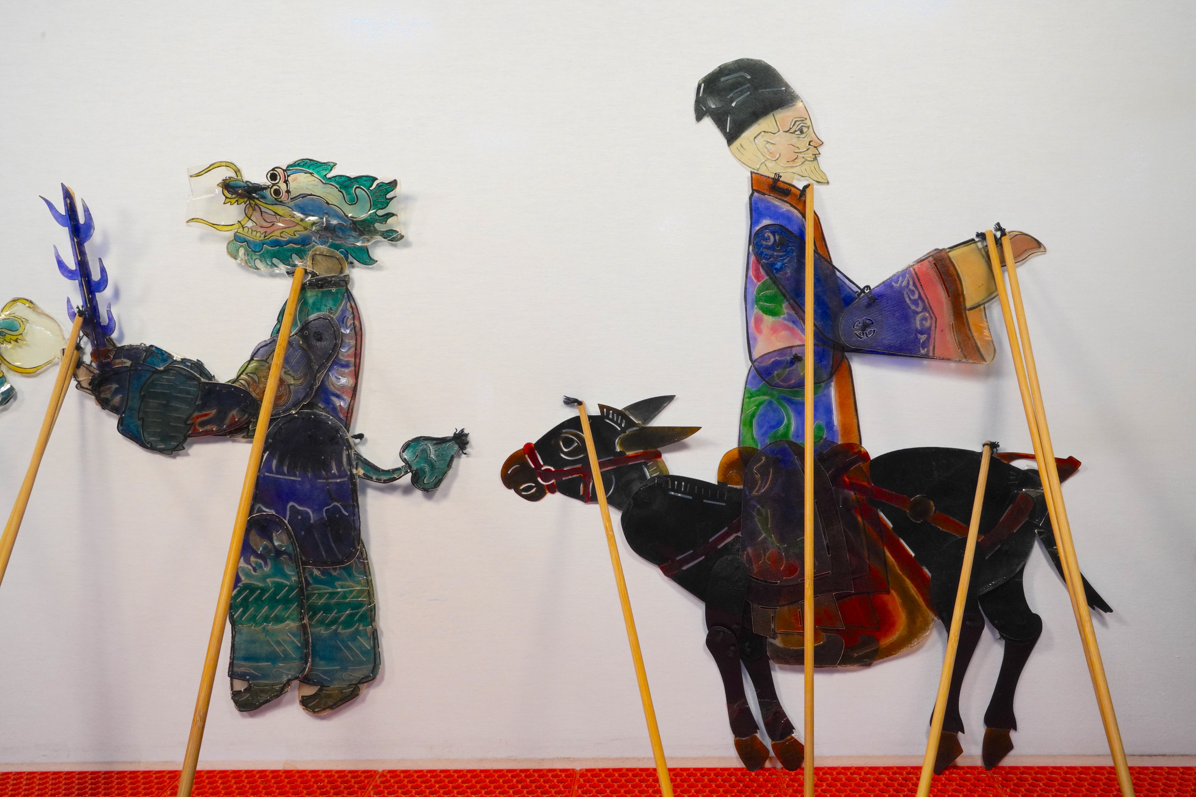 Shadow puppets made from donkey hide are pictured at the Kong Family Mansion in Qufu, Shandong Province. /CGTN