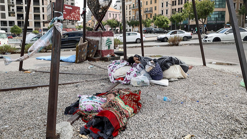 Displaced children sleep on the side walk in downtown Beirut, Lebanon, October 1, 2024. /CFP