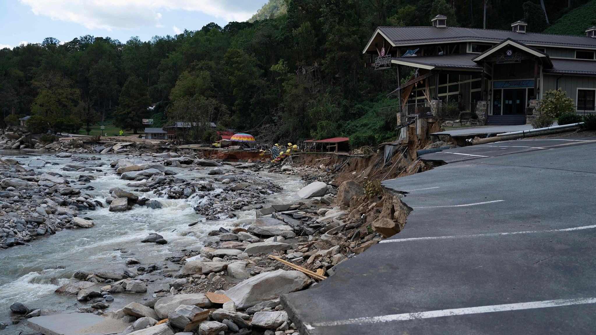 Damaged structures are seen along the Broad River in downtown Chimney Rock, North Carolina, after the passage of Hurricane Helene, October 2, 2024. /CFP