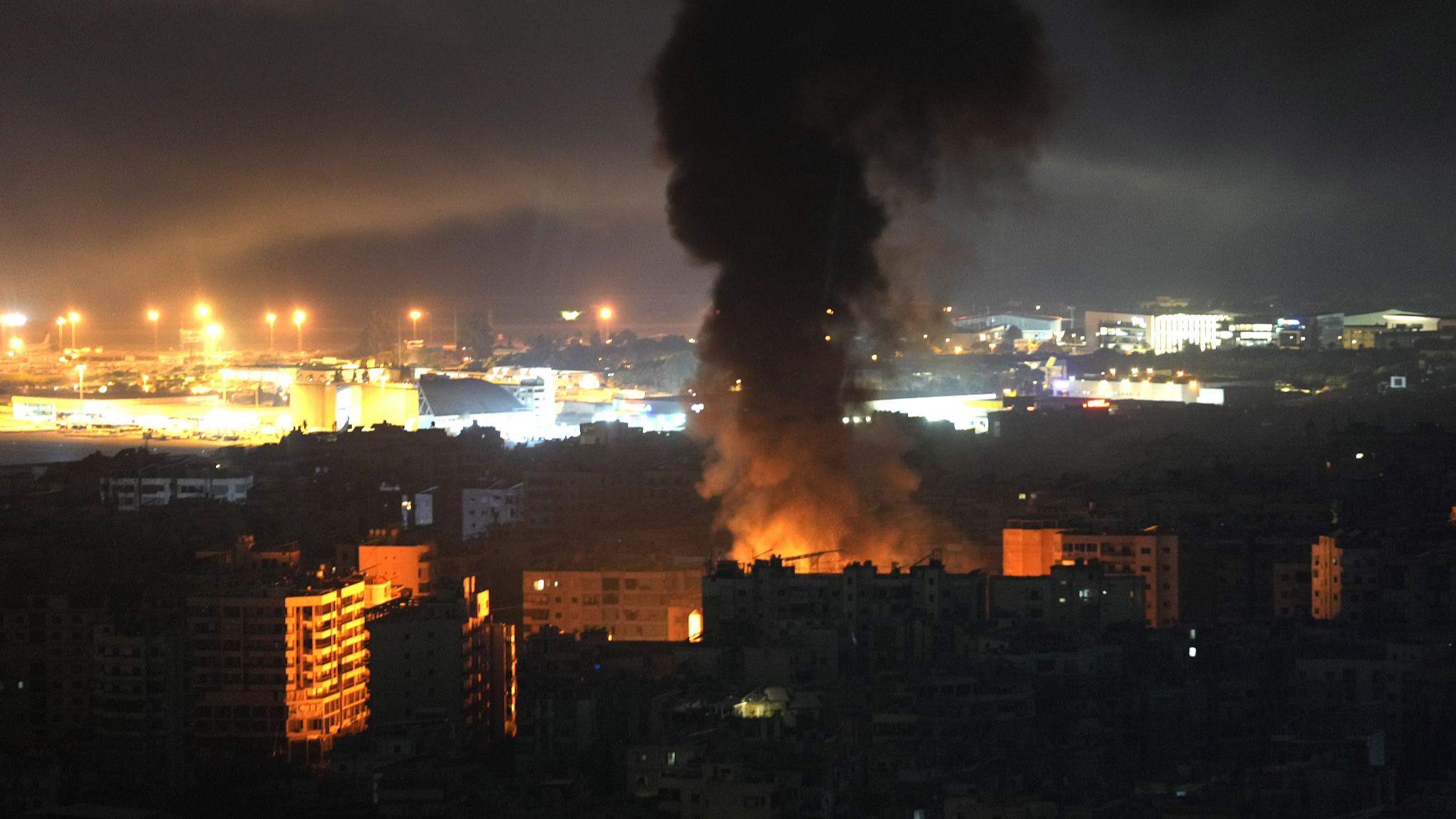 Flames and smoke rise from an exploded ammunition storage hit by an Israeli air strike in Dahiyeh, Beirut, Lebanon, October 6, 2024. /CFP