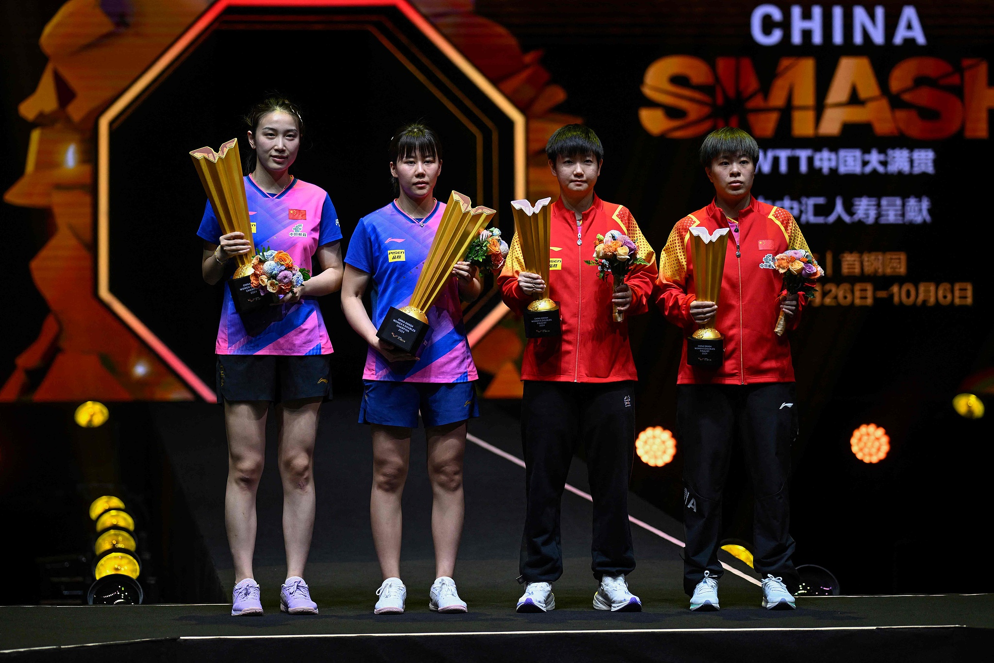 L-R: Qian Tianyi, Chen Xingtong, Sun Yingsha and Wang Yidi hold their trophies on the podium after their women's doubles final at the WTT China Smash in Beijing, China, October 5, 2024. /CFP 