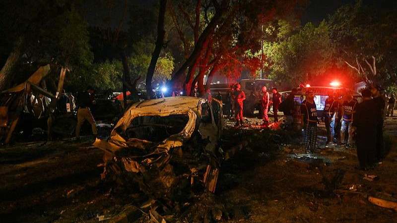 Security officials examine at the site of an explosion which occurred near Karachi airport in Karachi, October 6, 2024. /CFP