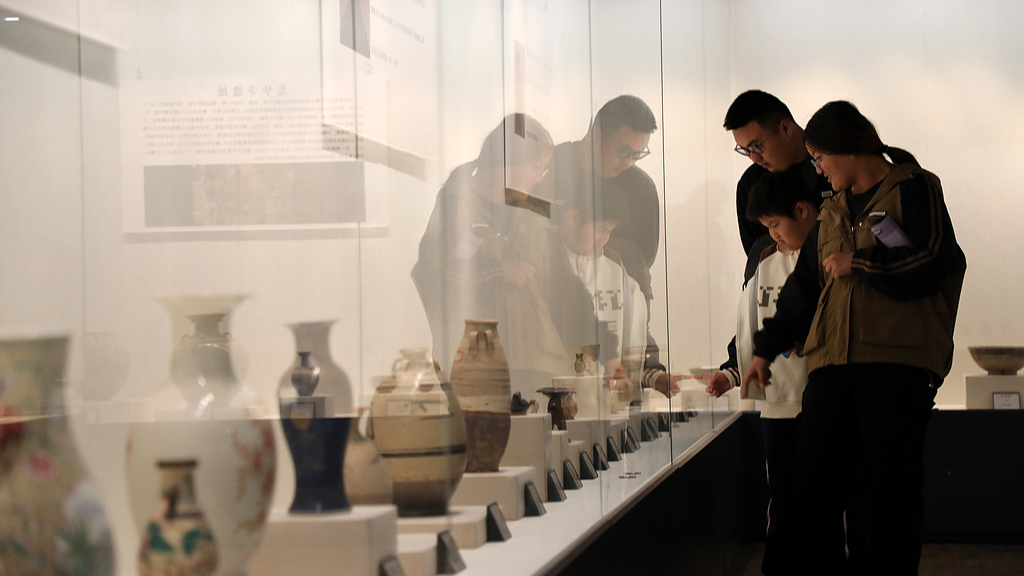 Visitors look at artifacts at the Museum of Boxing County in Binzhou City, east China's Shandong Province, October 5, 2024. /CFP 