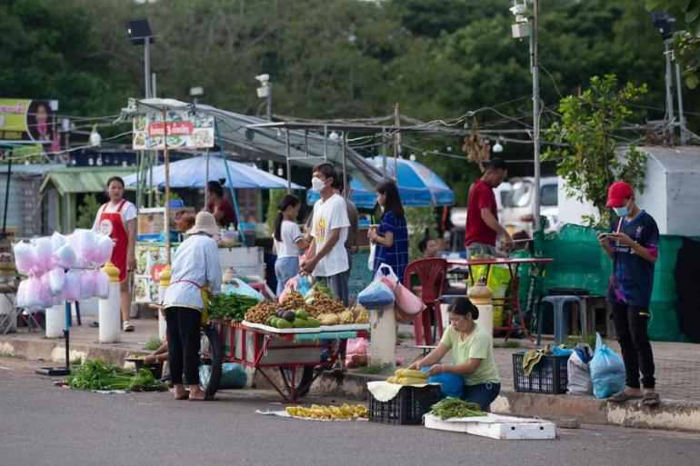 Vendors sell vegetables along the Mekong River in Vientiane, Laos, August 7, 2022. /CFP